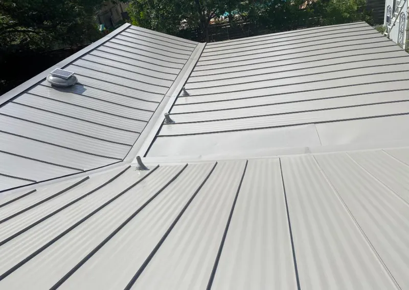 Solar attic fan installed on a metal roof for Roof Ventilation in Delhi